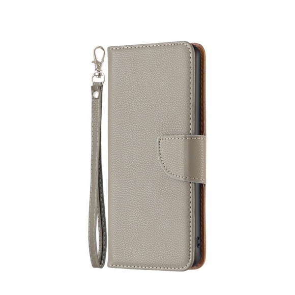 iPhone 14 Pro Max Leder Tasche Flip Cover im Litchi Look mit Kartenfach + Handschlaufe - Grau