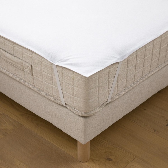 Matratzenauflage aus Molton mit Milbenschutz Matratzenauflage aus Molton mit Milbenschutz