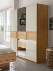 Wiemann, WIEMANN Drehtürenschrank »Kiruna«, WIEMANN Drehtürenschrank »Kiruna«, mit Champagnerglas und Spiegel