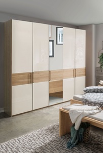 Wiemann, WIEMANN Drehtürenschrank »Kiruna«, WIEMANN Drehtürenschrank »Kiruna«, mit Champagnerglas und Spiegel