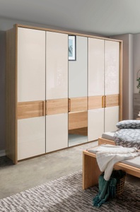 Wiemann, WIEMANN Drehtürenschrank »Kiruna«, WIEMANN Drehtürenschrank »Kiruna«, mit Champagnerglas und Spiegel