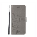 Samsung Galaxy S10 Leder Tasche mit Kartenfach + Handschlaufe Butterfly Flowers - Grau