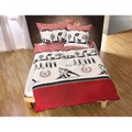 Bettwäsche mit traditionellen Schwingfest-Motiven in den Farben rot, schwarz und beige