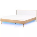 Beliani Bett heller Holzfarbton/weiss 180 x 200 cm mit LED-Beleuchtung bunt SERRIS