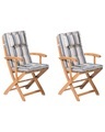 Beliani Gartenstuhl Akazienholz hellbraun 2er Set Auflagen dunkelblau / beige MAUI