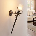 Rostfarbene LED-Wandfackel Tjark